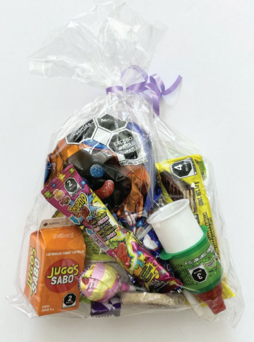 BOLSITA DE DULCES LISTON LILA+MINIPAYASO NUM17